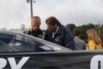 Tanner & Todd Christopherson praying before the race in Madison